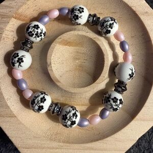 Floral Beaded Bracelet in Black, Pink, and Purple